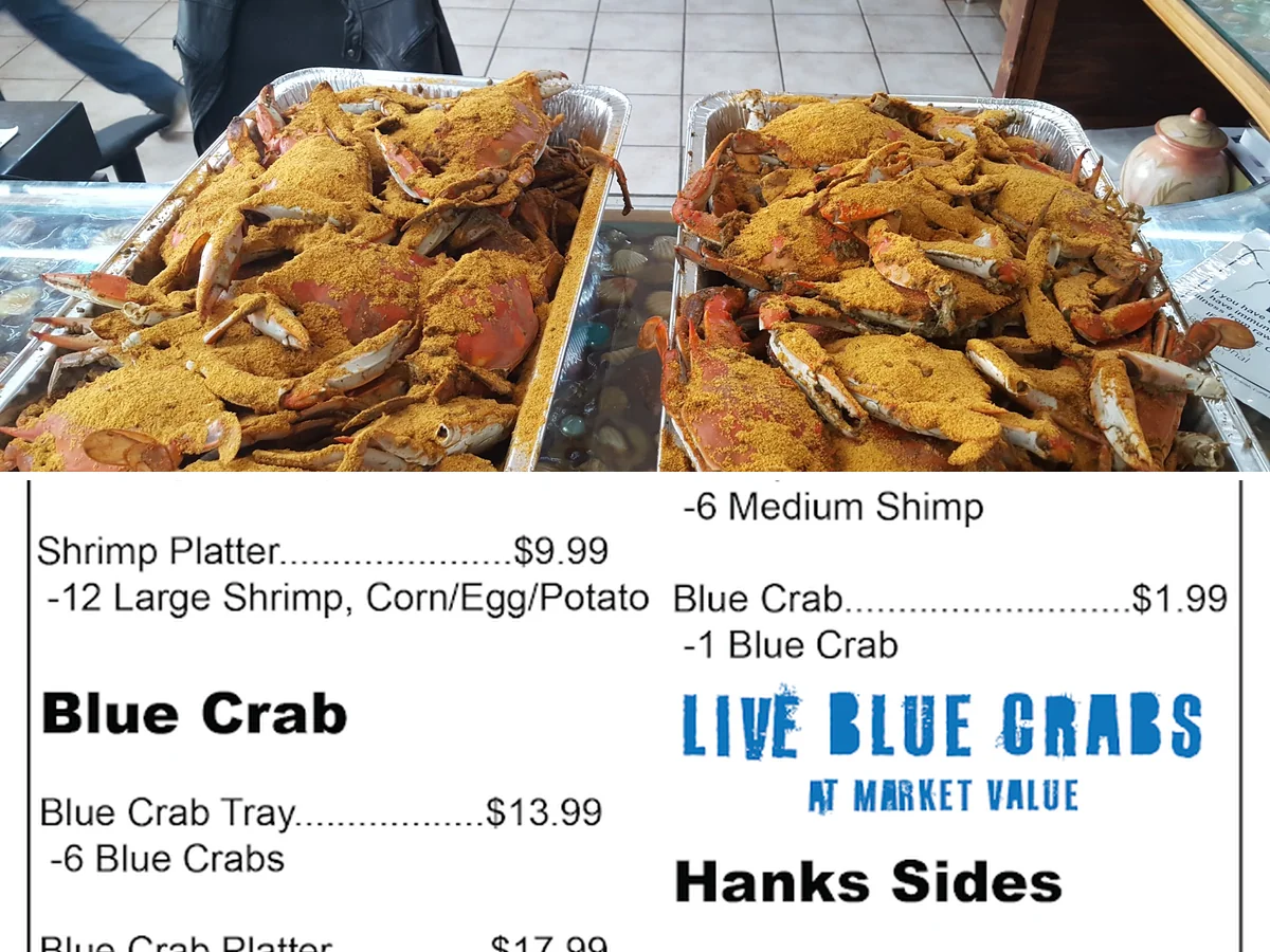 Takeout containers filled with crab and shrimp.